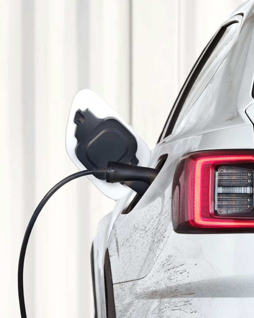 White Polestar 2 electric car charging - clear view